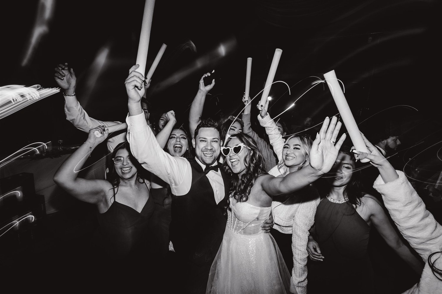 Vistabooths wedding guests laughing and holding props